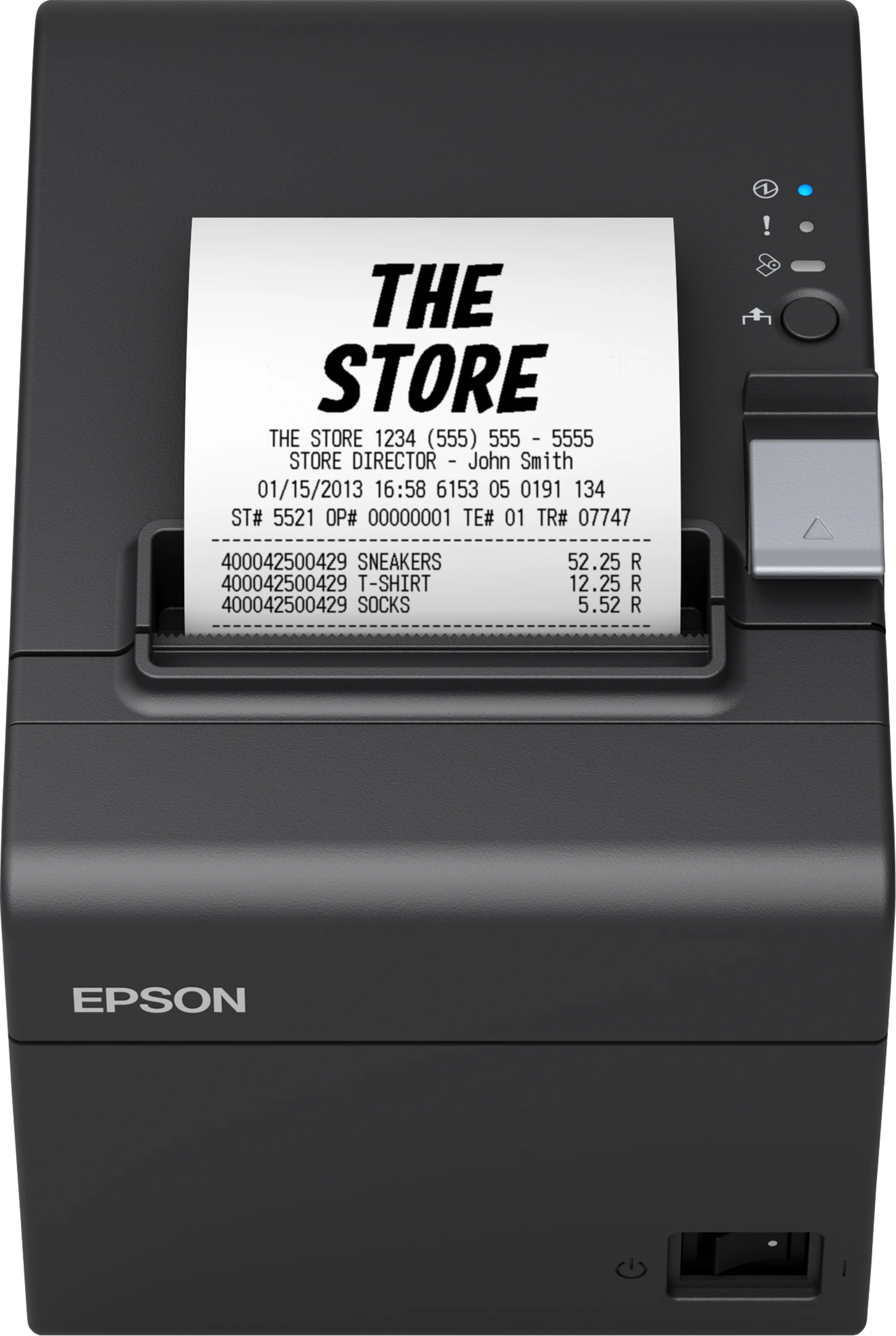 Compact receipt printer at a retail checkout counter, receipt printing mid-transaction.