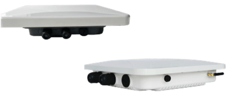 Ceiling-mounted wireless access point in a modern office environment.