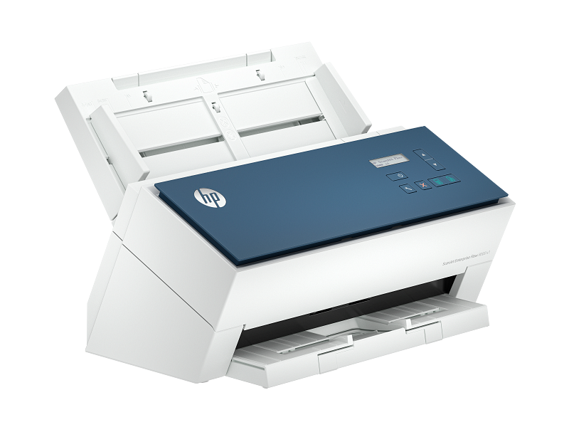 Product shot of an HP ScanJet flatbed or sheet-fed scanner on an office desk, with a stack of paper documents nearby.