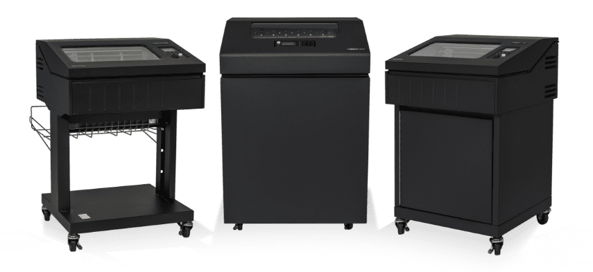 Line matrix printer in an industrial or warehouse setting, mid-print with multi-part forms.